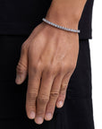 Model wearing 4mm white gold ice sparkler tennis chain set by Iceman Society, side view