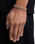 Model wearing 12mm 18k gold iceman cuban bracelet by Iceman Society