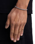 Model wearing 3mm white gold ice sparkler tennis chain set by Iceman Society, side view