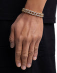 Model wearing 12mm 18K gold iceman cuban chain set by Iceman Society, side view