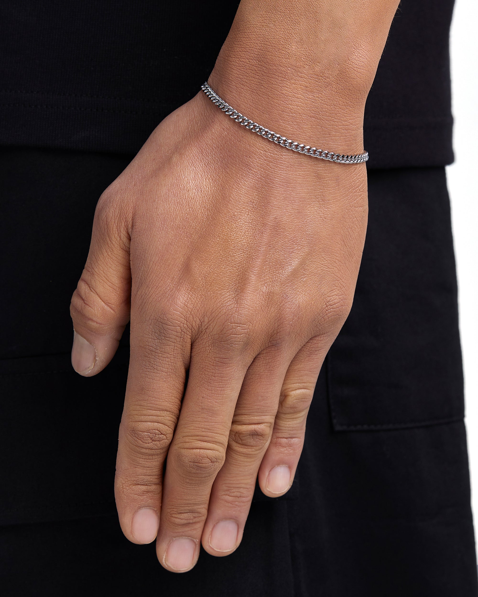Model wearing 3mm white gold plain cuban bracelet by Iceman Society