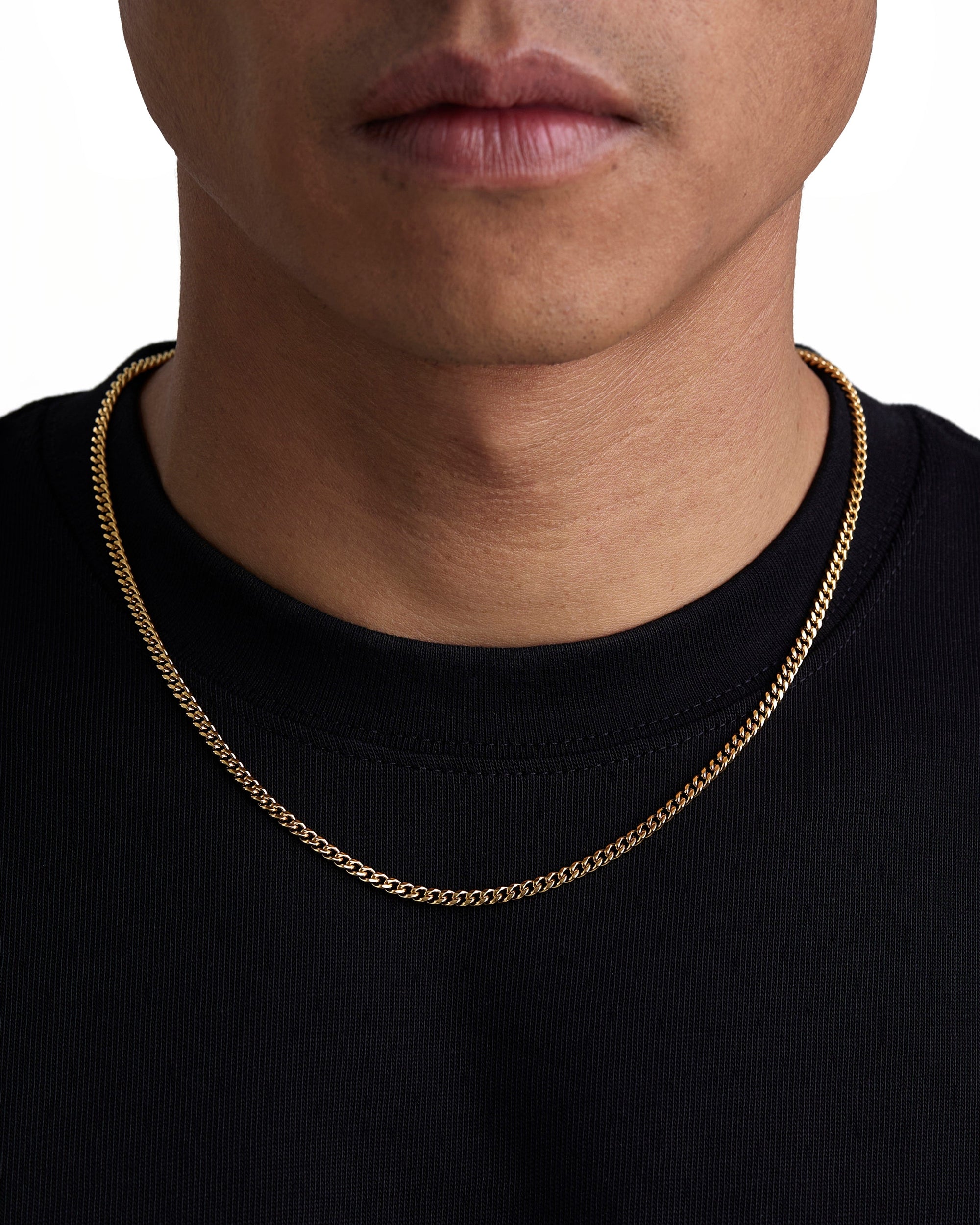 Model wearing 3mm 18K gold plain cuban chain set by Iceman Society, front view