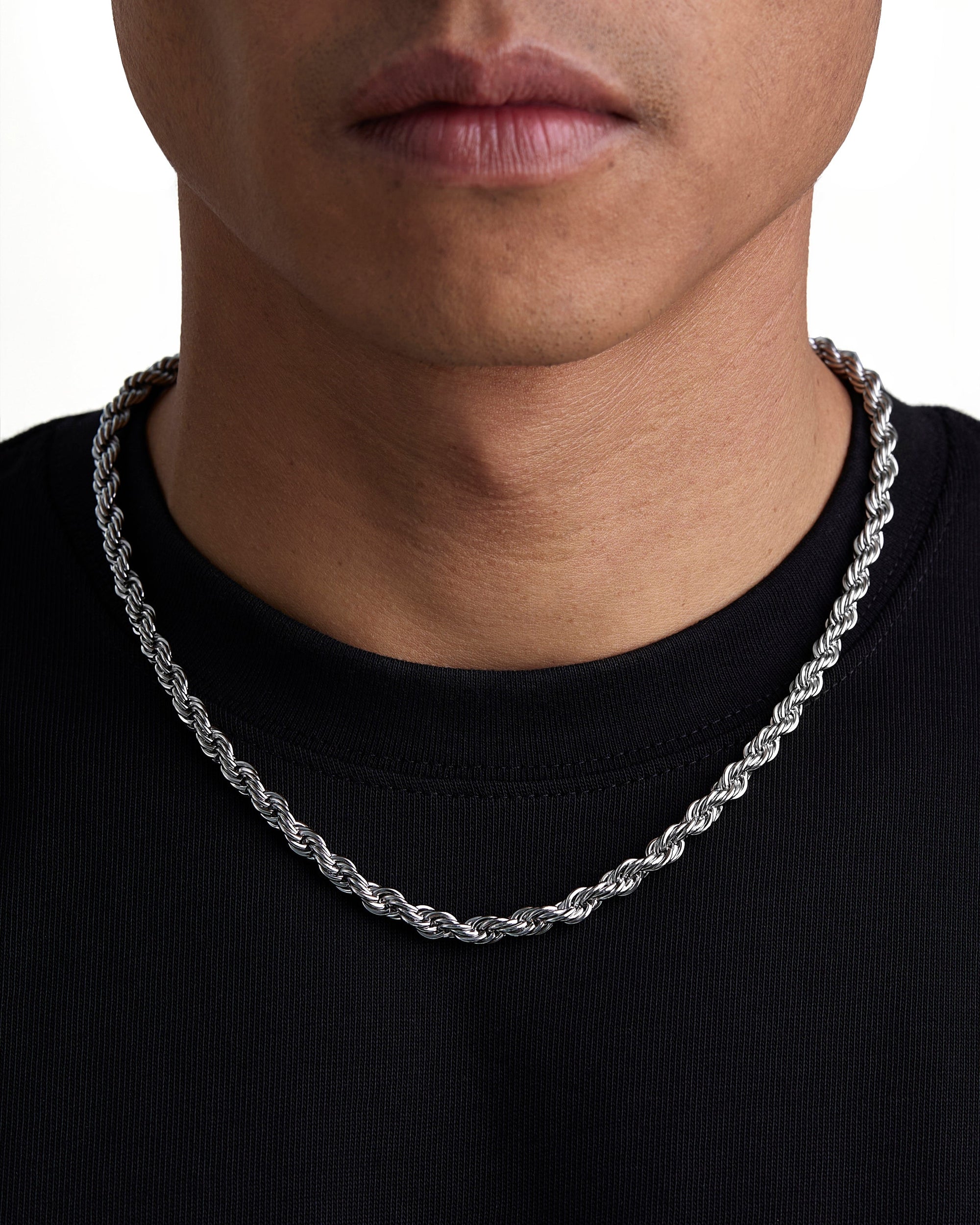 Model wearing 6mm white gold rope chain set by Iceman Society, front view